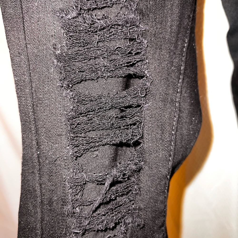Black ripped jeans from Fashion Nova
